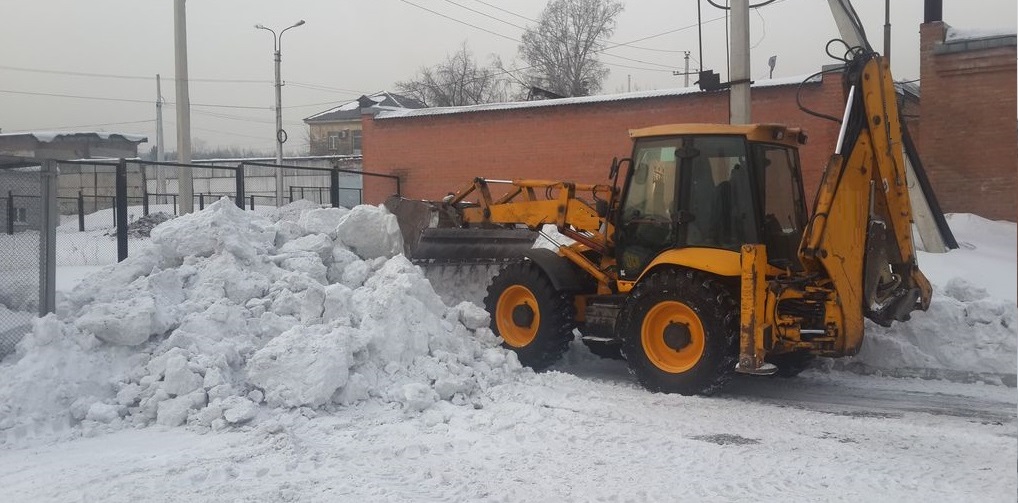 Экскаватор погрузчик для уборки снега и погрузки в самосвалы для вывоза в Орловской области